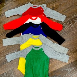 Primary 3-6 mo. Five long sleeve onesies.